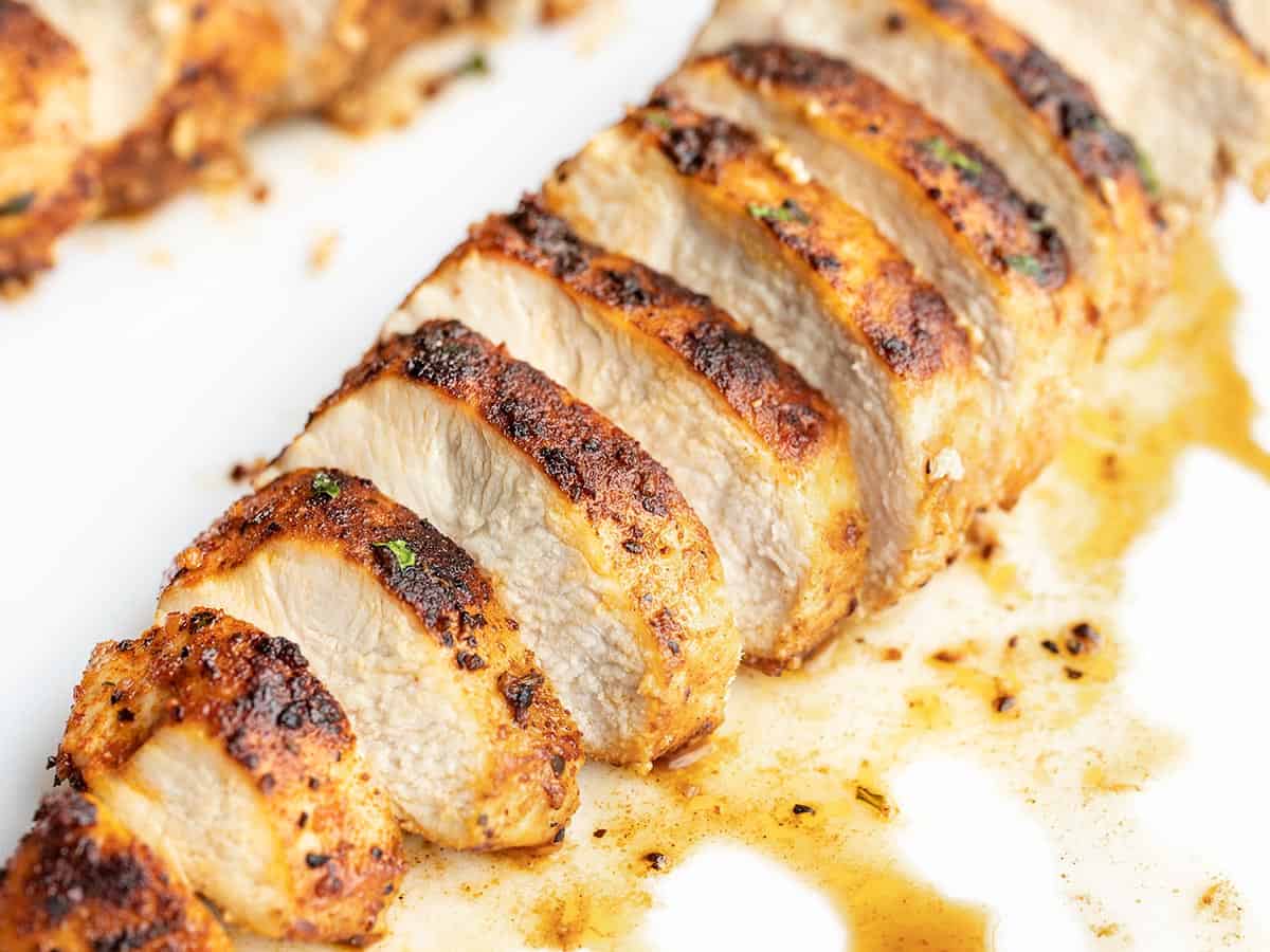 close up side view of sliced chicken breasts