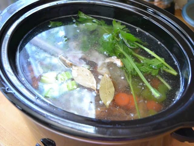 Water added to ingredients in slow cooker 