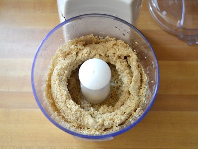 Toasted seeds and oil in food processor 