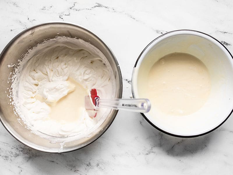 Add lightened sweetened condensed milk to whipped cream.