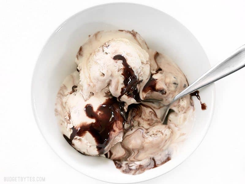 Overhead view of a half-melted bowl of No-Churn Mint Chocolate Chip Ice Cream