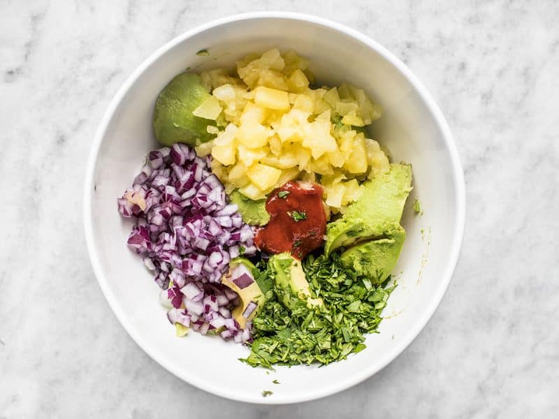 Best Ever Avocado Dip Ingredients chopped and put in mixing bowl 