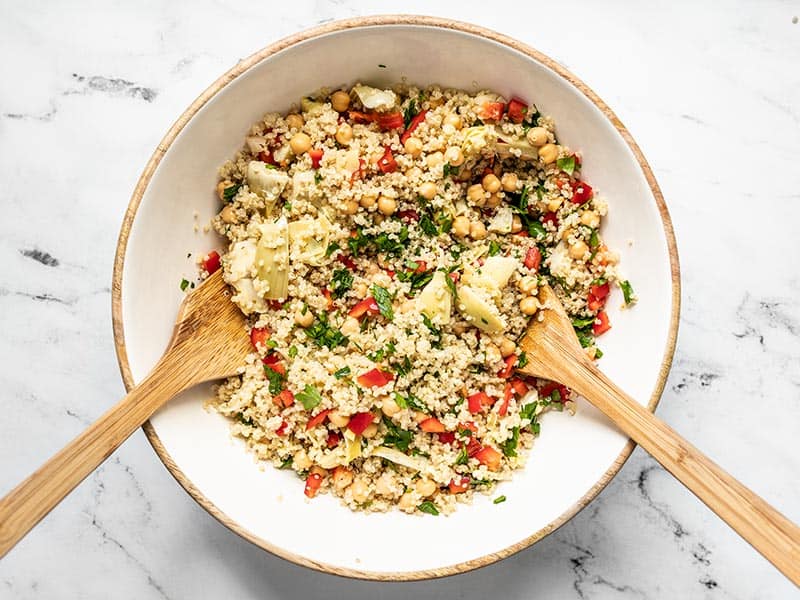 Add cooled quinoa to salad bowl