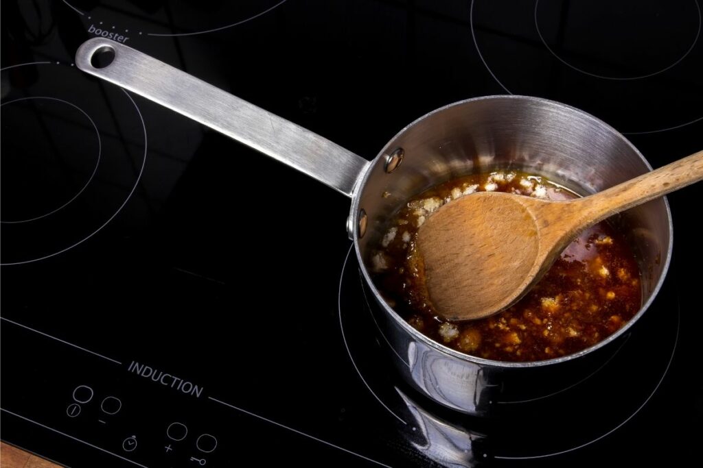 Why does the handle of a saucepan get hot when it is on the stove 06