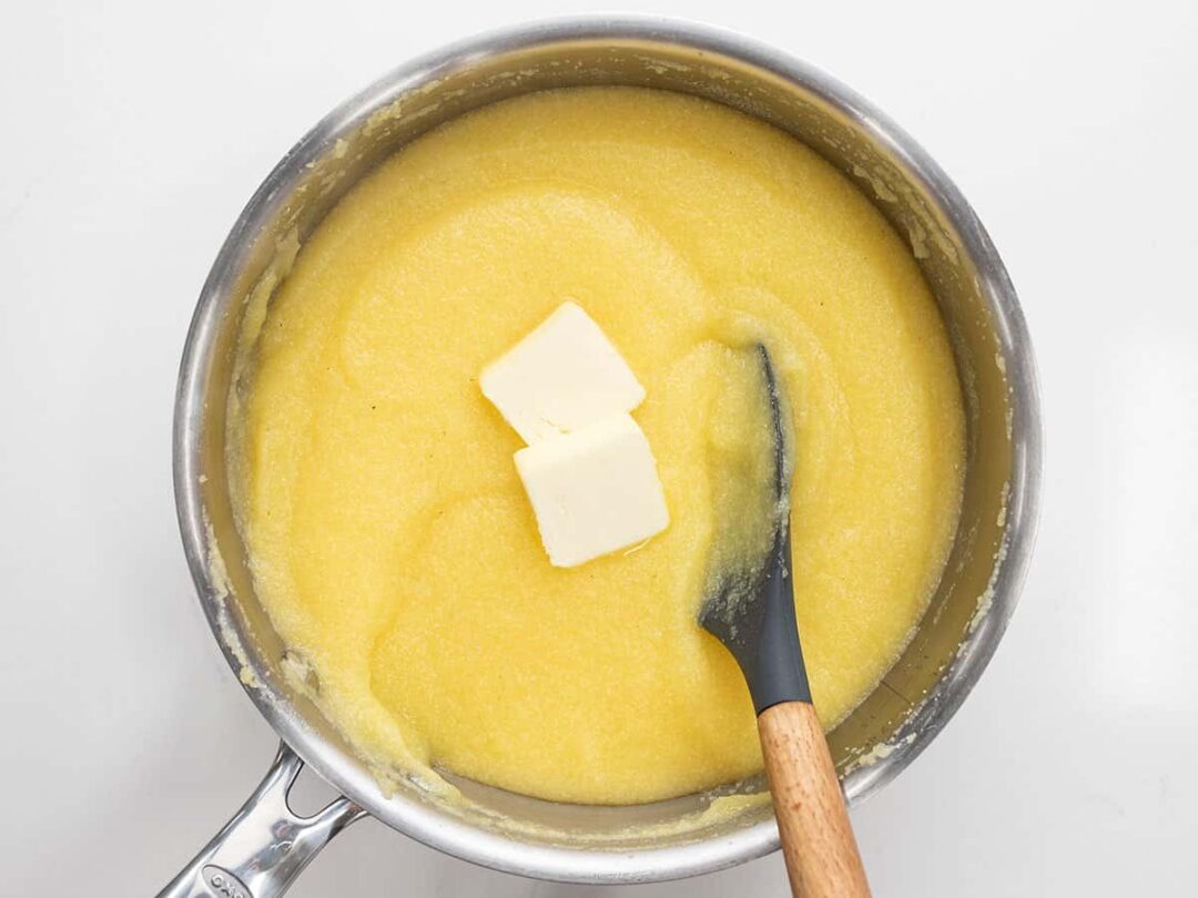 Butter added to cooked cornmeal.