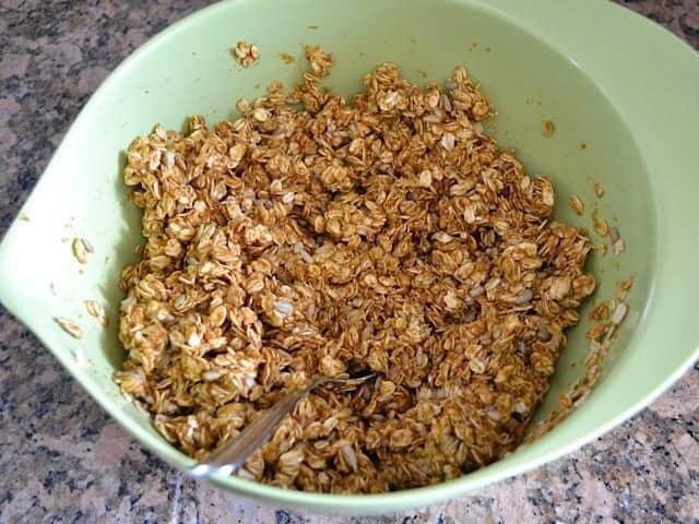 Uncooked Granola ingredients mixed in mixing bowl 
