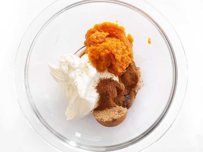 Pumpkin Cream Cheese Spread Ingredients in clear mixing bowl