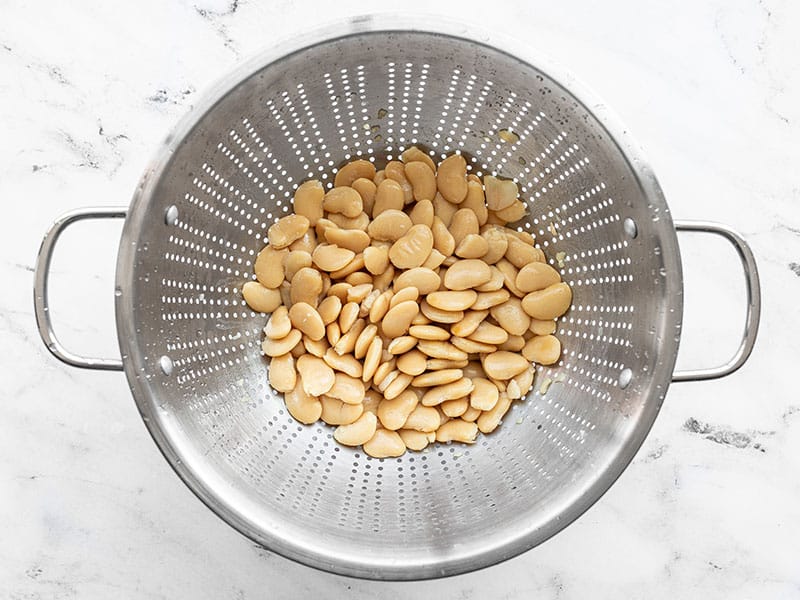 Rinsed white beans in a colander