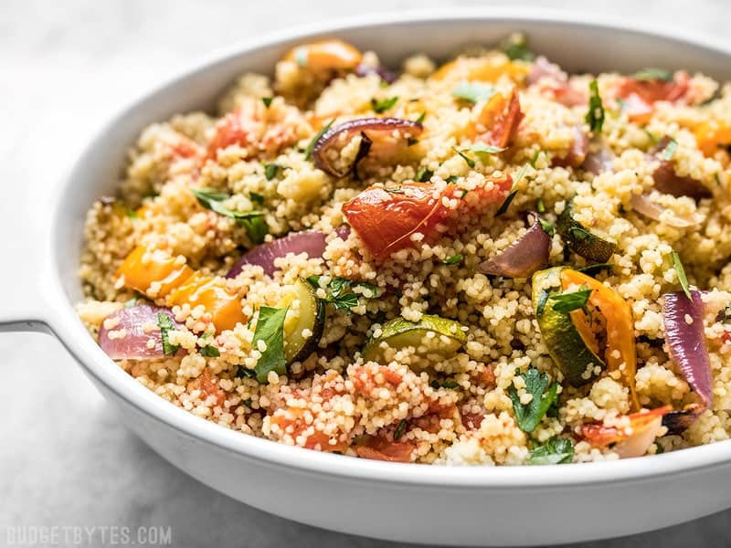 Side view of a casserole dish with Roasted Vegetable Couscous