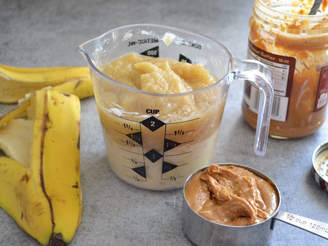 Mashed Bananas, Apple Sauce and peanut butter in measuring cup 