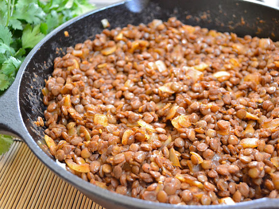close up of taco seasoned lentils in skillet 