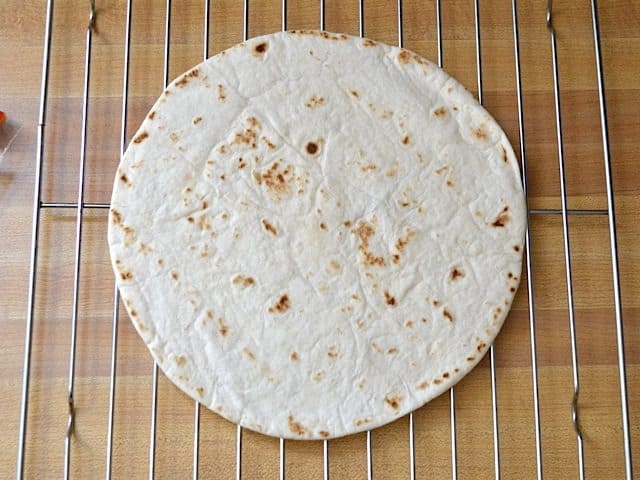 baked tortilla on wire cooling rack
