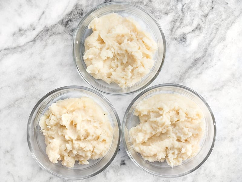 Start bowls with a layer of mashed potatoes