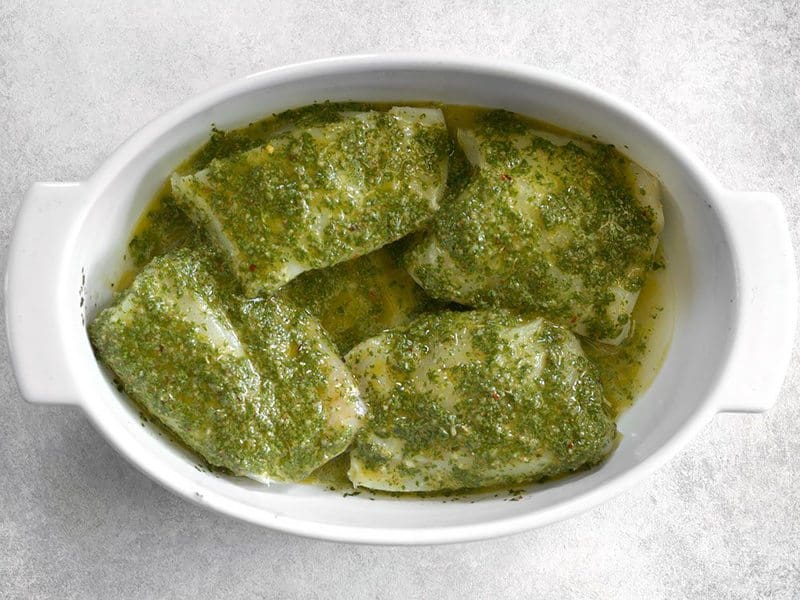 Chimichurri coated Fish in the casserole dish Ready To bake