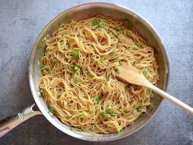 Mix Pasta and Sauce and top with green onion