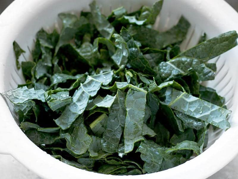 Kale cut into strips and rinsed in a colander